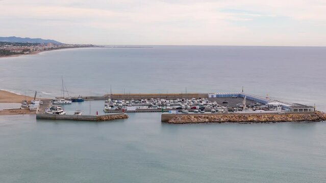 Aerial drone view of the marina in the Spanish coastal town named Comarruga