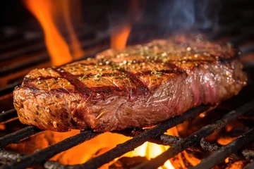  a close view of a seasoned steak over direct fire © altitudevisual