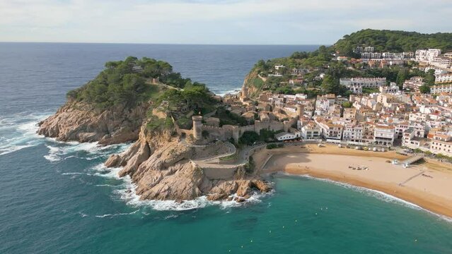 Aerial drone view of the coastal town named Tossa de Mar in Spain