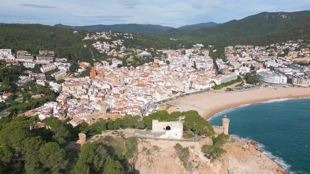 Aerial drone view of the coastal town named Tossa de Mar in Spain