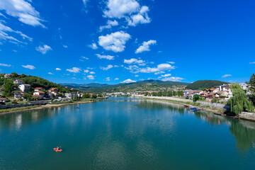 Fototapeta na wymiar Visegrad, Republic of Srpska, Bosnia and Herzegovina - August 13, 2023: View of the city of Visegrad in Bosnia and Herzegovina and the Drina River 