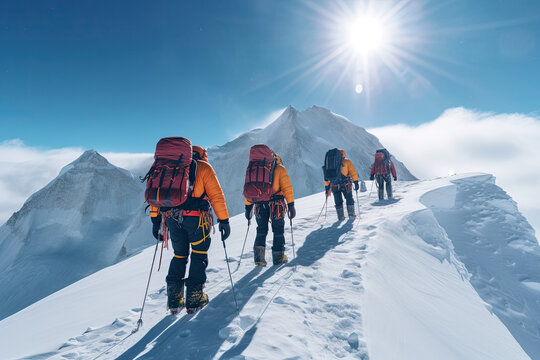 Image of a group of Sherpas and mountaineers climbing Mount Everest on a sunny day. It goes with all their equipment to be able to reach the summit.