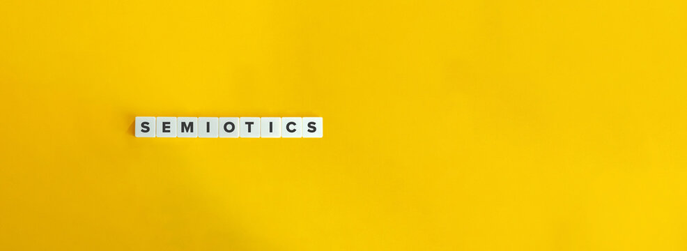 Letter Tiles on Yellow Background. Minimal Aesthetic.