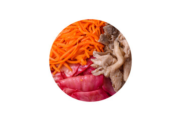 Delicious spicy mushrooms, carrots, cabbage sliced and cooked in Korean style