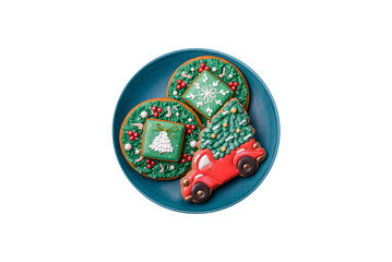 Beautiful Christmas gingerbread cookies on a round ceramic plate