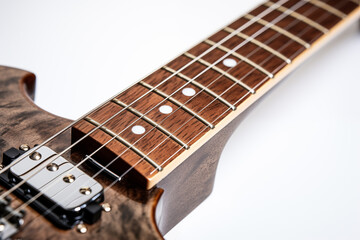  A close-up of A brown electric guitar