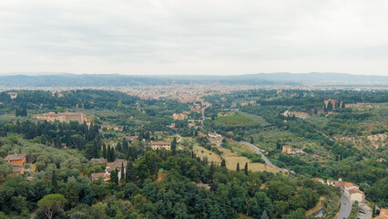 Fototapeta na wymiar Florence, Italy. General view of the city in cloudy weather. Summer, Aerial View