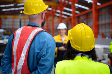 Blue collar worker work at metal sheet factory.