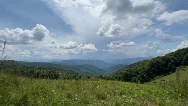 timelapse of the movement of clouds among the grassy slopes of the Carpathian mountains