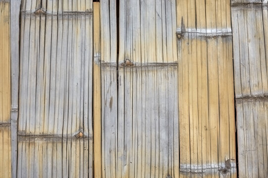 Close up photo of bamboo mat wall, natural background.