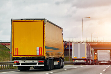 Cargo truck on the mountain highway. Delivery truck on the Europe motorway. Global delivery concept.