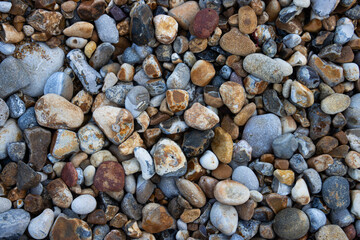 Colorful sea pebbles and rocks for natural background