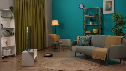 Cozy living room with many modern gadgets switching on without human involvement. Smart house concept.