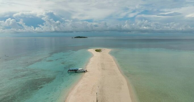 Aerial view of sandy beach and turquoise water. Timba Timba islet. Tun Sakaran Marine Park. Borneo, Sabah, Malaysia.
