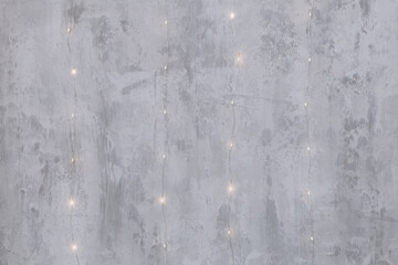 Cozy flat apartment photo studio room green Christmas Tree gifts presents garlands, candles white decorated toys balls interior New Year lights glowing bokeh
