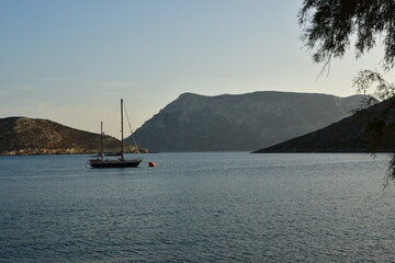 Sailing Boat in Bay on greek island kalymnos Greece