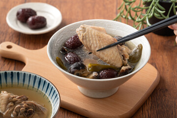 Delicious Taiwanese peeled green chili pepper chicken soup with mushroom