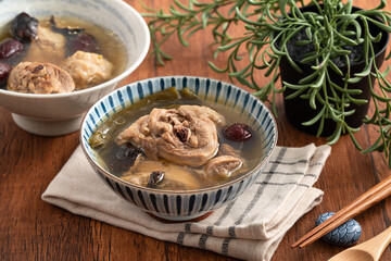 Delicious Taiwanese peeled green chili pepper chicken soup with mushroom
