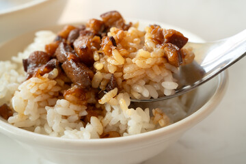 Braised meat over cooked rice, famous and delicious street food in Taiwanese restaurant.