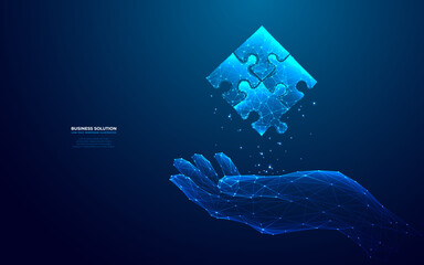 Abstract hand-holding jigsaw puzzle hologram in futuristic light blue style. Digital business solution concept. Low poly wireframe vector illustration on dark technology background.  - obrazy, fototapety, plakaty