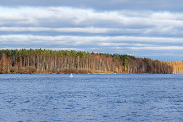 Svir river, fairway view with white and red buoys on a sunny day