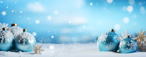 Fototapeta na wymiar Image of blue Christmas balls and snowflakes on a snowy background. This image can be used as a greeting card or as a background for a holiday related website or advertisement.