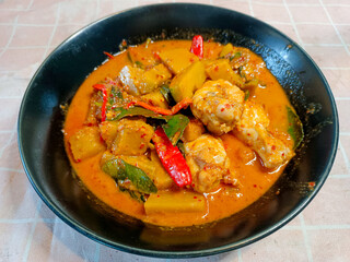 The menu is called 'Chicken Pumpkin Curry, featuring a rich curry paste.