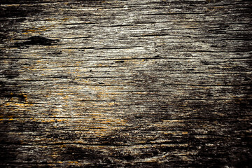 Fototapeta premium This photograph beautifully highlights the intricate and weathered surface of aged, brown wood.