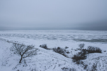 Icy seashore after a blizzard