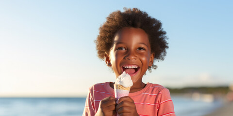 Child on beach eating ice cream on a hot day