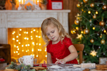 Beautiful children, blond kids, siblings, playing in decorated home for Christmas, enjoying holidays