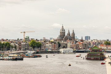 Fototapeta premium modern Amsterdam city center, canals and bridges.