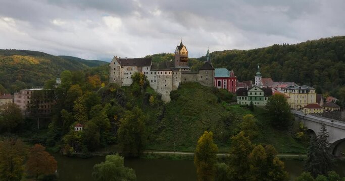 Aerial View medieval castle Loket Czech Republic during Sunset
