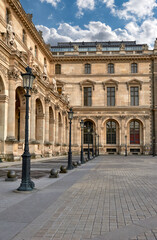Fototapeta na wymiar Fragmental view of Louvre palace, Paris