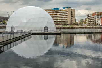 Gordijnen ball-shaped pavilion on the embankment © Elena