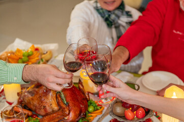 Family celebration party enjoy happy to eat dinner together with full food of turkey and drink for celebrate merry xmas in Christmas thanksgiving and New Year festive. Christmas dinner group family.