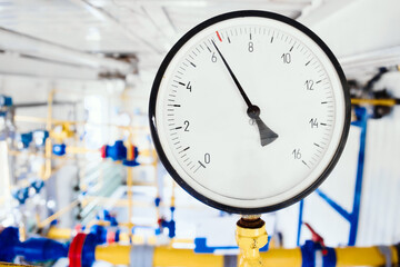 View of pressure gauge on gas distribution station equipment. Pressure sensor for natural gas supply in pipes. Supply of natural gas. Beginning of heating season in Europe.