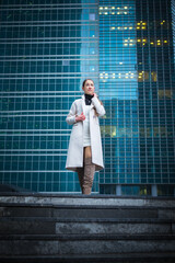 young woman walking in a business center