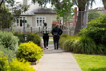Fototapeta na wymiar lesbian couple walking together in a park