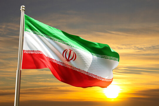 Flag of Iran on flagpole against the sunset. 3d-rendering