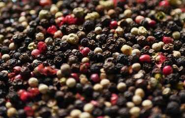 Peppercorn texture. Colorful peppers spices.