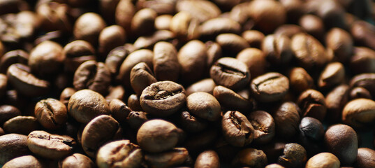 Close up coffee beans texture. Caffeine drink banner