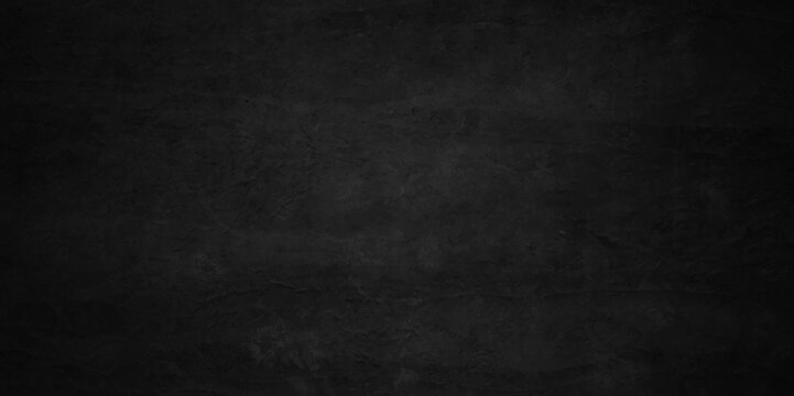 	
Black stone wall texture grunge rock surface. dark gray concrete background backdrop. wide panoramic banner. old wall stone for dark black distressed grunge background wallpaper rough concrete wall.
