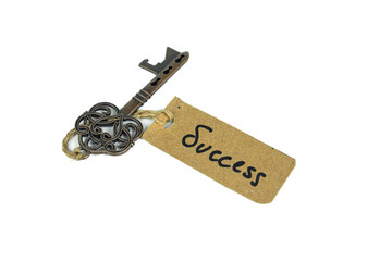 Key to Success concept - Old key with success tag isolated on white background
