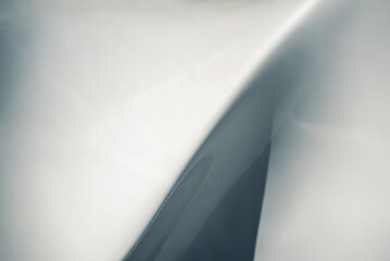 blue and gray abstract background from curved lines of geometric shapes