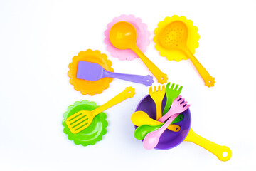 Children's toy dishes, isolated on a white background.