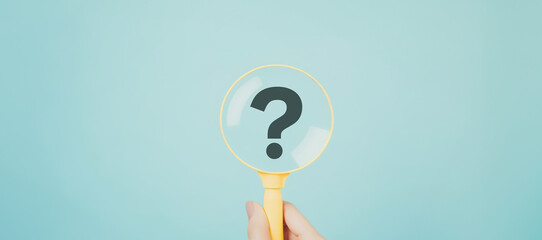 International ask a question day concept, Magnifying glass focused on question mark, Answer, Q&A,...
