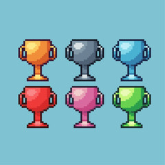 Pixel art sets of gold medal cup with variation color item asset. Simple bits of golden champion cup pixelated style. 8bits perfect for game asset or design asset element for your game design asset.