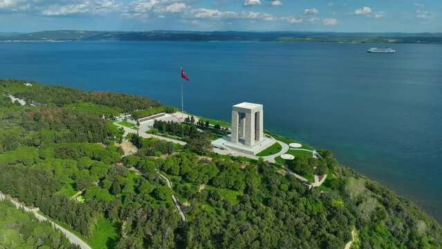 Martyrs Monument Canakkale. Turkish flag. Red Turkish flag waving on the sea. Drone Shoot