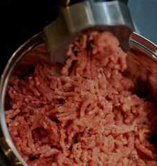 meat is minced in a meat grinder